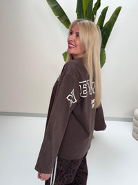 Statement Sweater braun NEW YORK