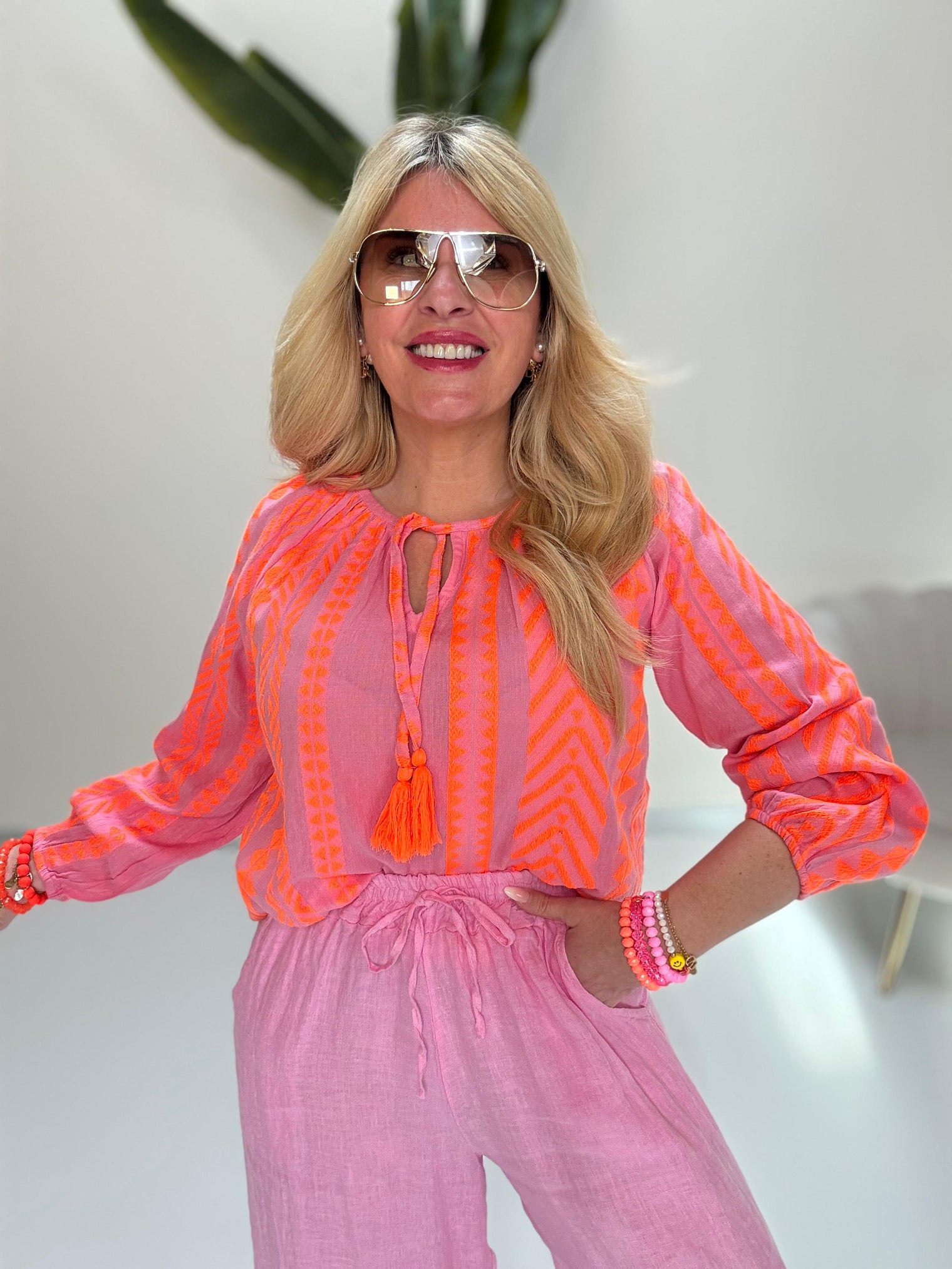 Bluse BOHO BASH rosa/orange mit Quastenbändchen